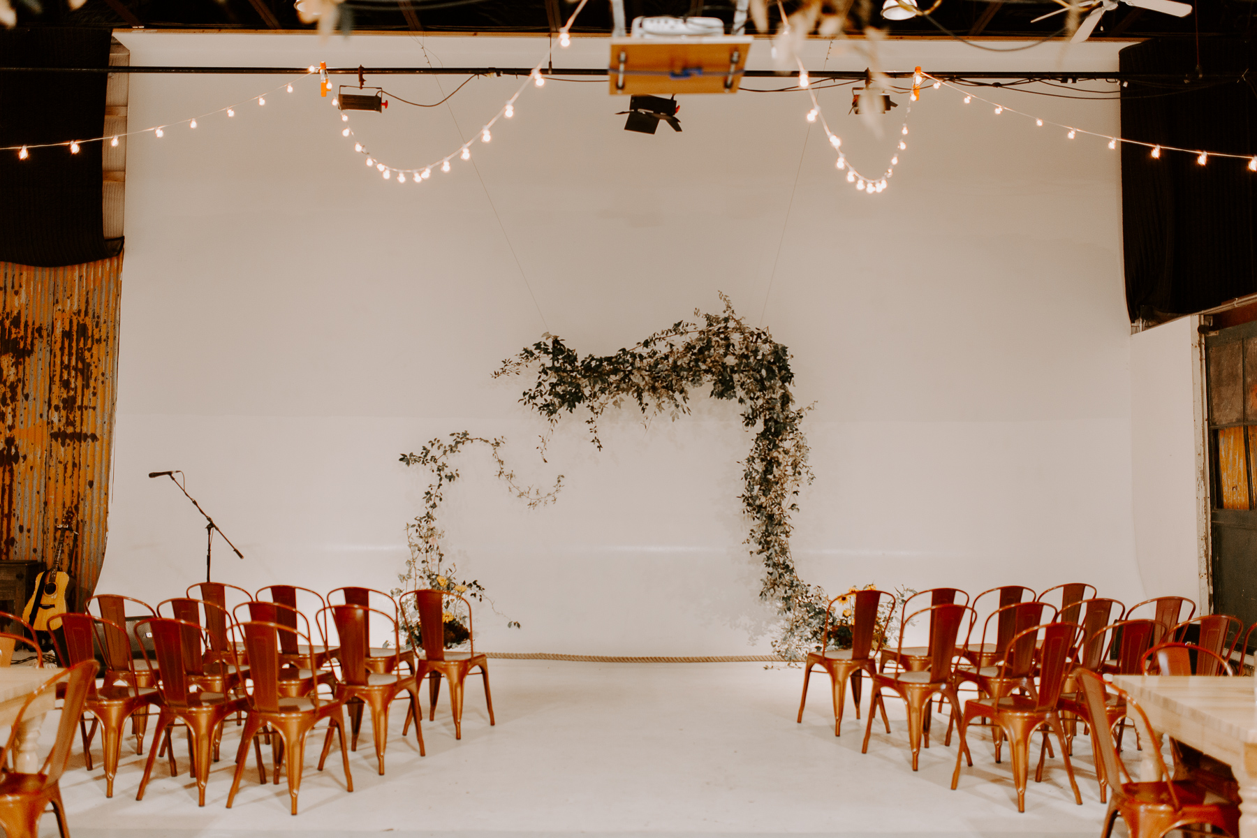 The ceremony location set up inside O'Maine Studios for a wedding